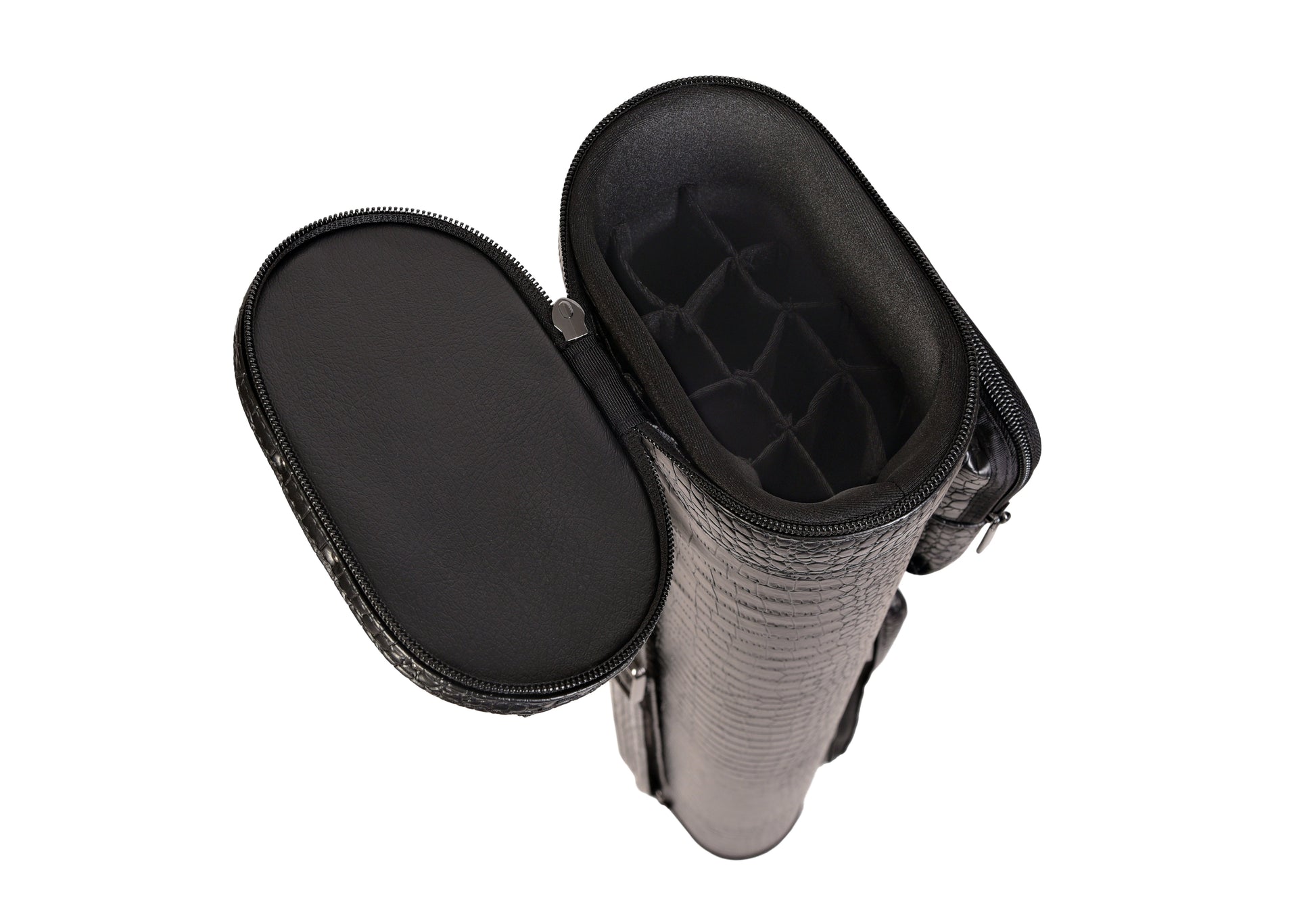 Interior of hard case showing compartments for cues