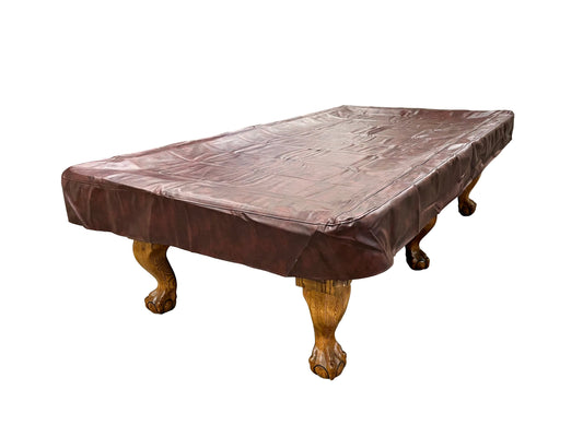 ASKA 8-Feet Burgundy Heavy Duty PVC billiard table cover on table. TCH8BUR